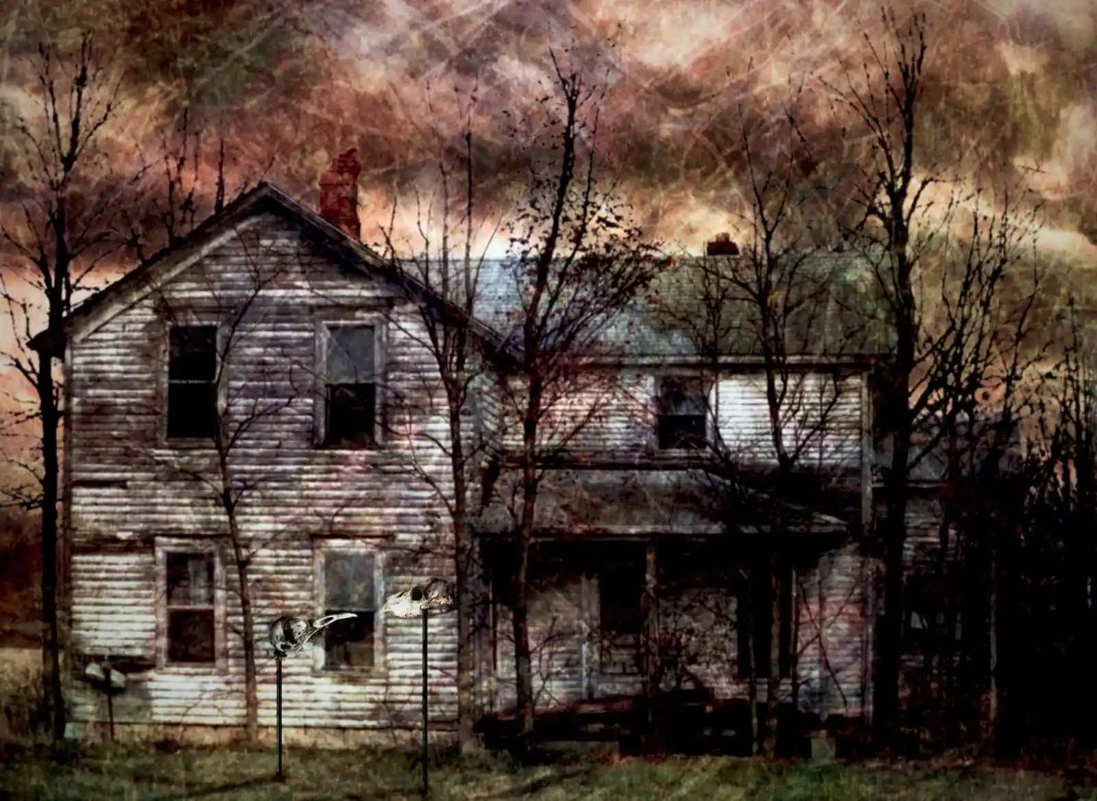 An abandoned farmhouse stands under a sky tinged with ominous reds and browns. Bare trees claw at the sky, their branches like skeletal fingers reaching for something long lost. The house is dilapidated, with windows shattered and walls scarred by the ravages of time. Two animal skulls mounted on sticks guard the entrance, adding a touch of eerie foreboding to an already unsettling scene. The air is thick with the weight of forgotten memories.