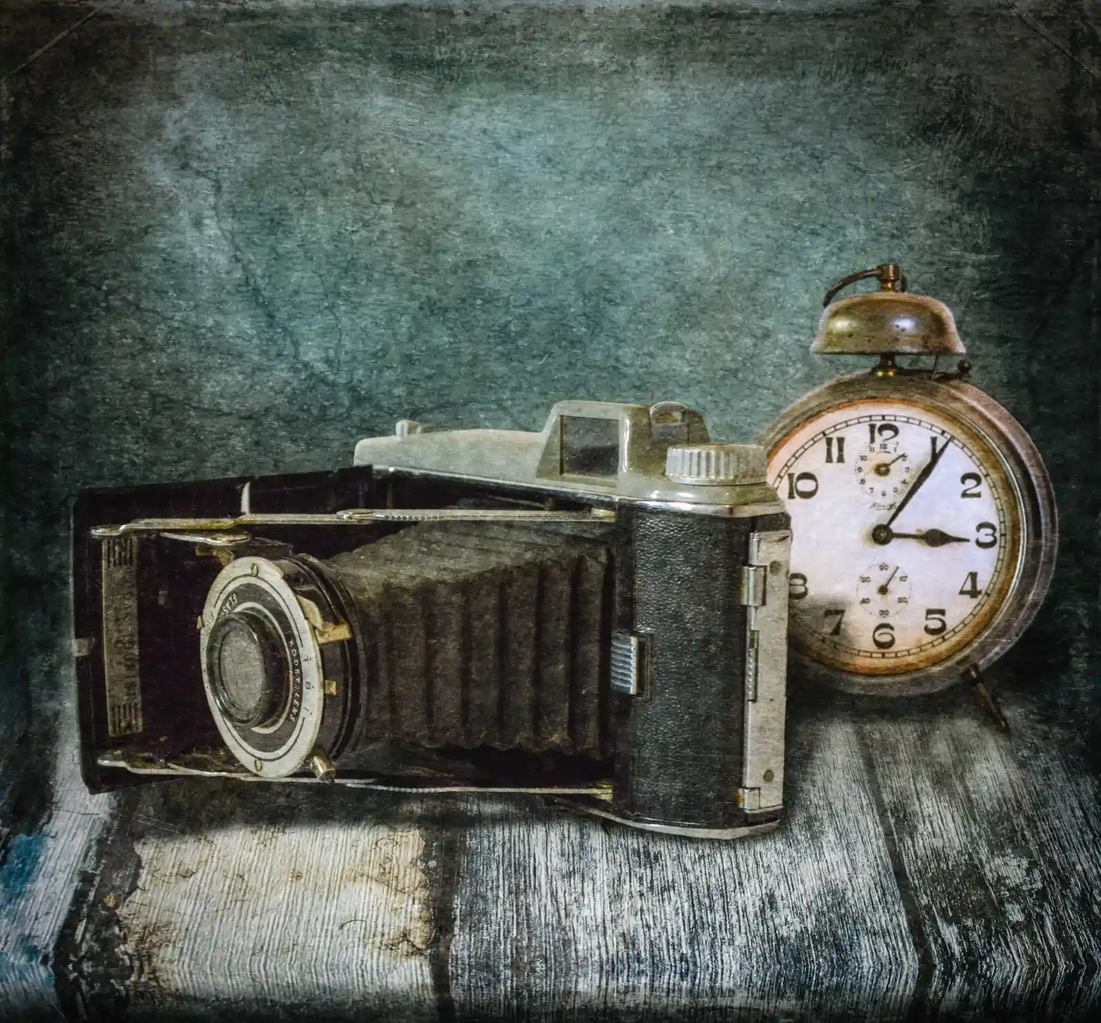 A worn, vintage camera rests on a weathered wooden table, its accordion lens extended as if preparing to capture lost moments. Beside it, an old-fashioned alarm clock stands frozen at three o'clock. Together, they whisper of forgotten afternoons, of photographs never taken and time slipping away like water through cupped hands, a duet of nostalgia in a silent room where the past still holds court.