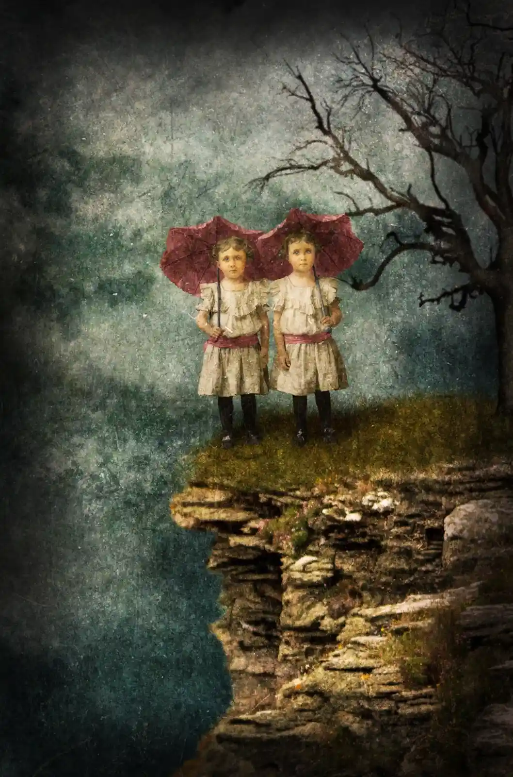 Two twin girls in matching white dresses stand on the precipice of a rocky cliff, each holding a red umbrella that glows like blood against the stormy sky. Their expressions are serene, untouched by the abyss yawning beneath their feet. Behind them, a twisted, barren tree reaches out like a claw. It's a place where innocence flirts with danger, where the line between reality and nightmare is as thin as the wind-whipped edge they stand upon.