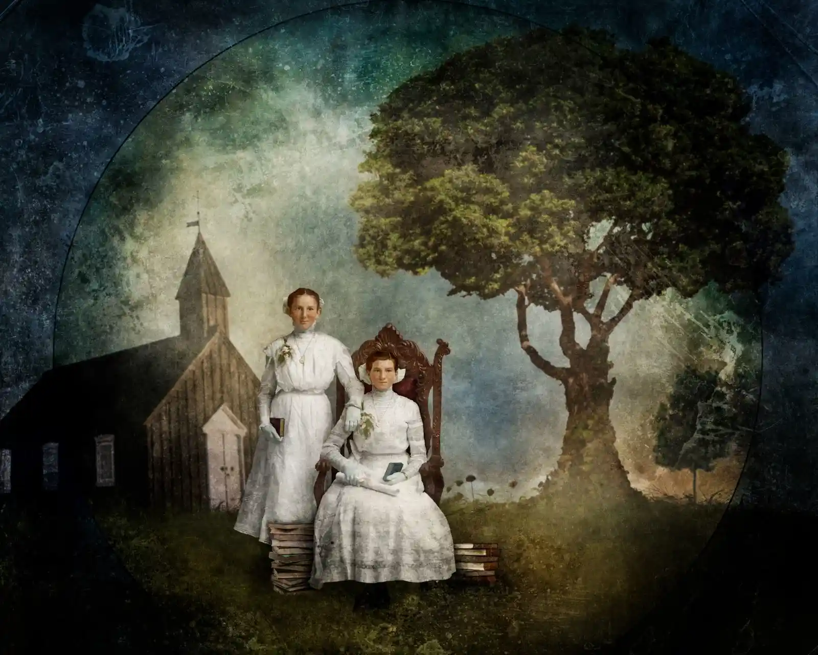 Two women in white dresses pose stiffly outside a small, weathered church. A large tree shadows them, its branches stretching wide. The younger woman sits on a throne-like chair; books are stacked at her feet. Both carry small bouquets, their eyes distant, as if listening to something unheard by others.